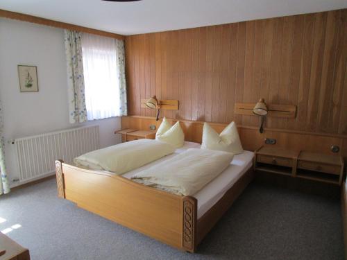 Ein Bett oder Betten in einem Zimmer der Unterkunft Pension Unterstein