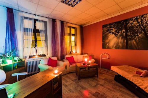 a living room with a couch and a table at Ubytování v soukromí v Oáze klidu v Jindřichově Hradci in Jindrichuv Hradec