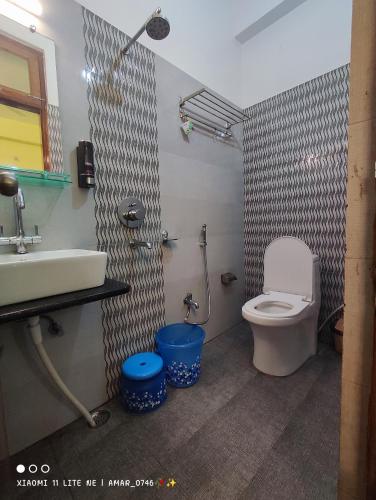 Koupelna v ubytování Hotel Prabhat