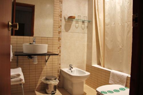 Ванна кімната в Hotel Garona
