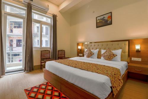 Ένα ή περισσότερα κρεβάτια σε δωμάτιο στο Shanti Vilaas