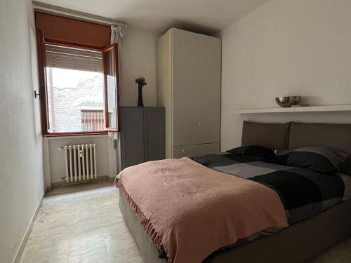 Tempat tidur dalam kamar di Appartamento in pieno centro storico