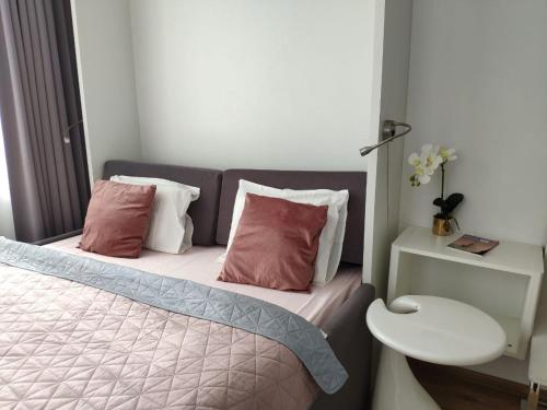 Postel nebo postele na pokoji v ubytování Apartamenty Aleje Jerozolimskie