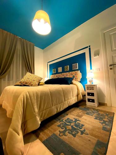 Una cama o camas en una habitación de Le Caserie Locanda di Charme