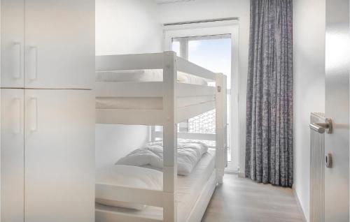 Ένα ή περισσότερα κρεβάτια σε δωμάτιο στο Cozy Apartment In Blankenberge