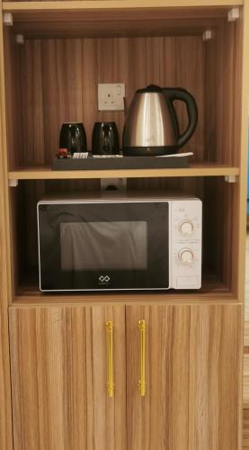 Dapur atau dapur kecil di فندق الإطلالة الذهبية الفندقية