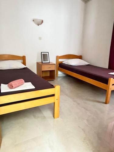 two beds sitting in a room with at ADRIA in Podaca