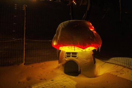 a gingerbread house with a red roof in the snow at Tumba Sisli Vadi in Kartepe