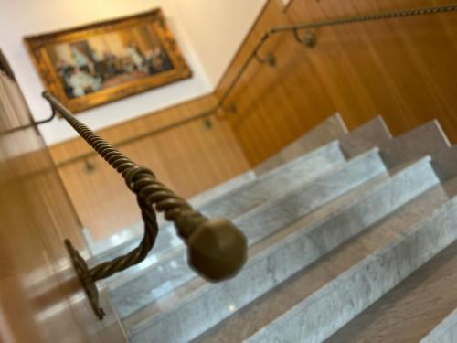 a view of stairs in a building with a light at Hotel Futuro in Aversa