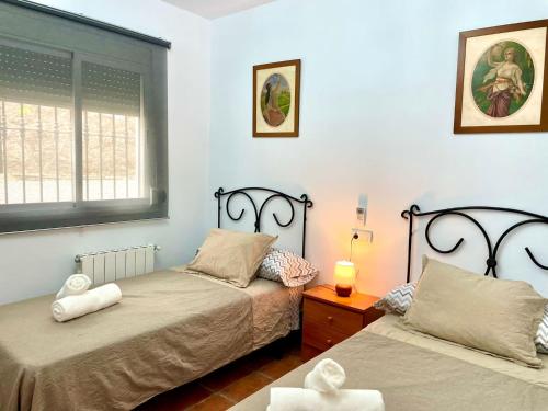 Postel nebo postele na pokoji v ubytování Casa Moreno