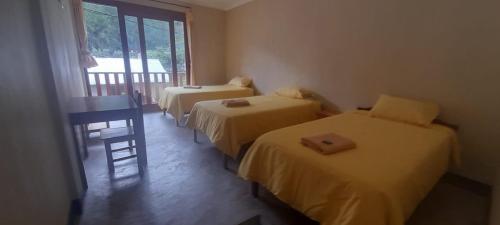 Ένα ή περισσότερα κρεβάτια σε δωμάτιο στο La Posada de Gocta