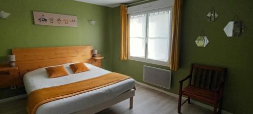 Postel nebo postele na pokoji v ubytování Escales dans les dunes