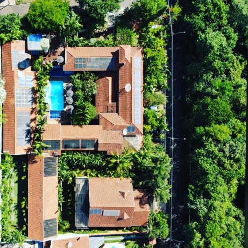 an overhead view of a house with trees at Hotel Natural - SPA & Lazer in Brotas
