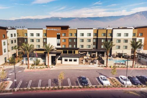 an aerial view of a hotel with a parking lot at Residence Inn by Marriott Loma Linda Redlands in Redlands