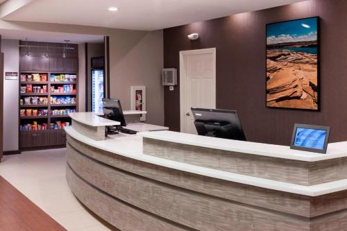 a lobby of a pharmacy with a reception desk at Residence Inn by Marriott Provo in Provo