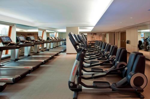 a row of pilates equipment in a gym at The Westin New York at Times Square in New York