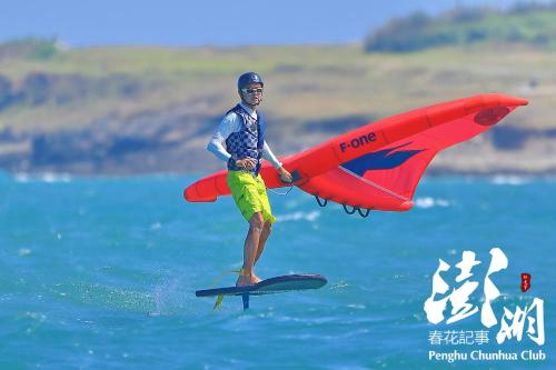 a model of a man riding a surfboard with a toy plane at Sunrise B&B in Huxi