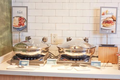 two pots and pans sitting on top of a counter at Fairfield Inn & Suites by Marriott Stony Creek in Stony Creek