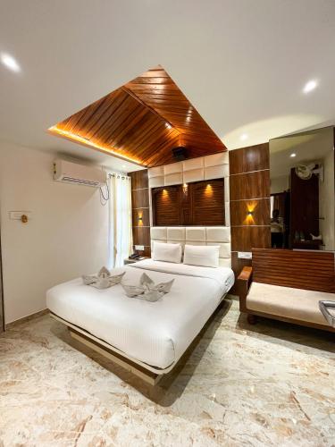 Ένα ή περισσότερα κρεβάτια σε δωμάτιο στο Krishna's Wood Villas