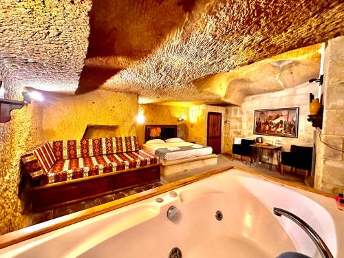 Katil atau katil-katil dalam bilik di Harkasos Cave Hotel