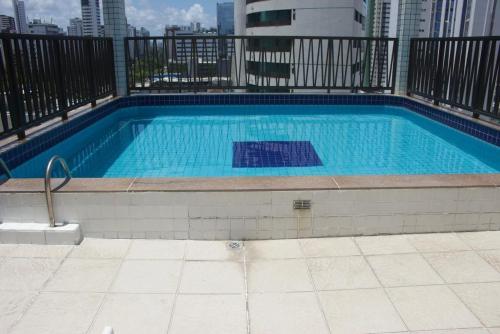 Piscina en o cerca de Lindo Apartamento com piscina à 100m do MAR