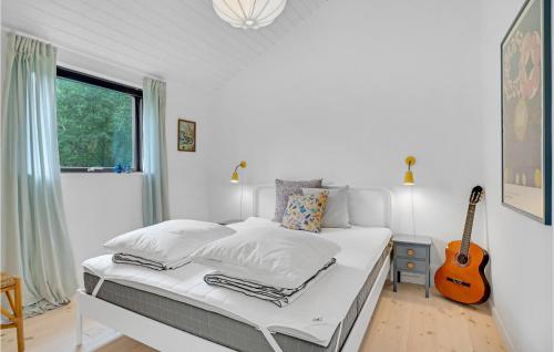 Postel nebo postele na pokoji v ubytování Nice Home In Vig With Wifi And 4 Bedrooms