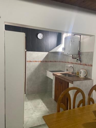 a kitchen with a sink and a counter top at Cassanova I in San Luis