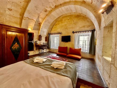 Katil atau katil-katil dalam bilik di Harkasos Cave Hotel
