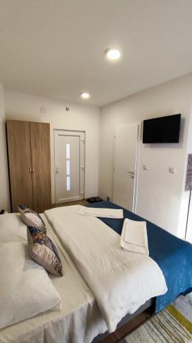Apartmani Toki Balkanaにあるベッド
