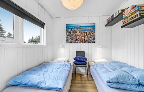 Postel nebo postele na pokoji v ubytování Awesome Home In ster Assels With Sauna
