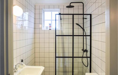 a bathroom with a shower and a sink at Amazing Home In Mrrum With Wifi in Mörrum