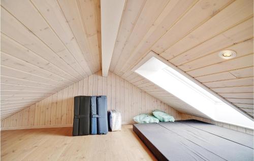 a room with a bed in a tiny house at Four-Bedroom Holiday Home In Odder in Odder