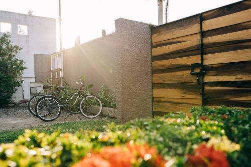a group of bikes parked next to a fence at Casa Sirena in Ixtapa