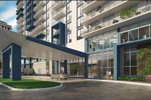 eine künstlerische Darstellung eines geplanten Apartmentgebäudes in der Unterkunft APARTMENT FOR RENT 2 BED 2 BATH 1 Parking DOWNTOWN DORAL in Miami