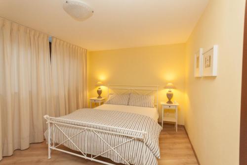 Postel nebo postele na pokoji v ubytování Casa Fara - Plesio by LoveComo