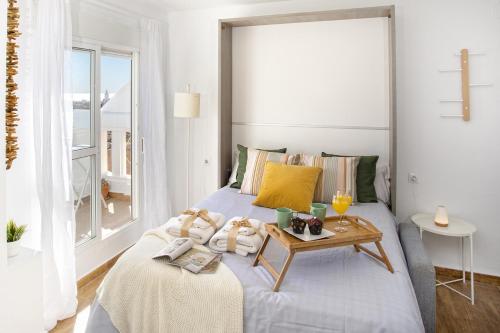 Postel nebo postele na pokoji v ubytování -MalagaSunApts-Alcazaba Andalusian Dream