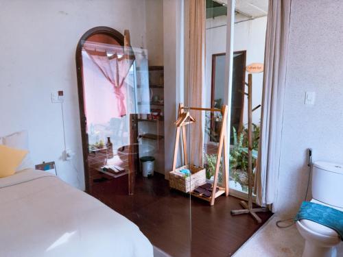 Koupelna v ubytování Cherry Suites Dalat