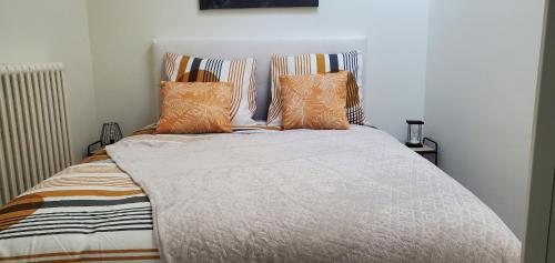 Posteľ alebo postele v izbe v ubytovaní Triangle d'or - Calme et Cosy, Appartement 1 chambre