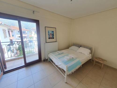 Ein Bett oder Betten in einem Zimmer der Unterkunft Agria Lux Apartment