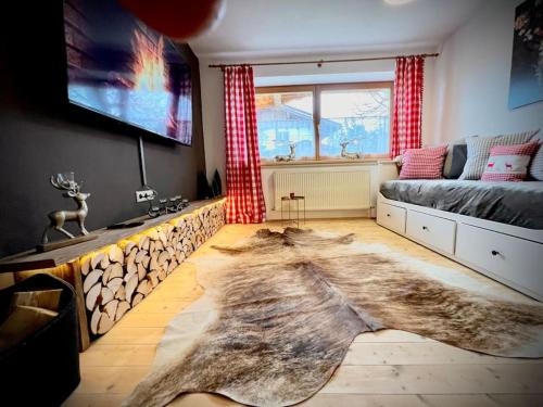 Ferienwohnung Steinbock Terrasse, Gartensauna, Garten, Grillplatz