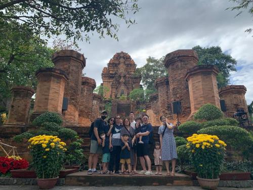 a group of people standing in front of a castle at Banyan Villa Nha Trang in Nha Trang