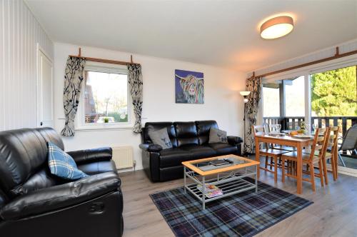 Χώρος καθιστικού στο Holy Loch Lodge