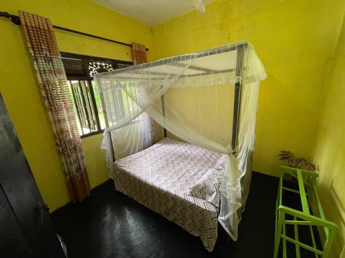 Katil atau katil-katil dalam bilik di Mahiru Homestay