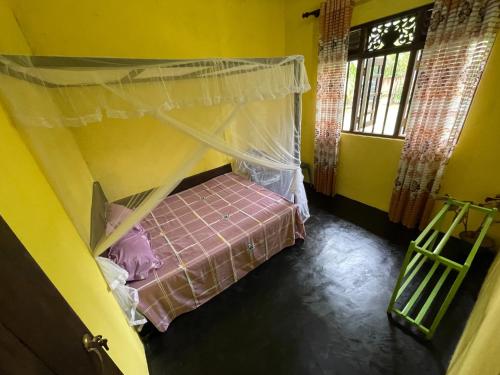 Katil atau katil-katil dalam bilik di Mahiru Homestay