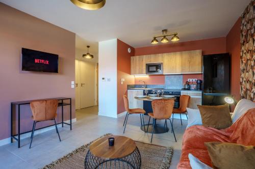 Kuchyň nebo kuchyňský kout v ubytování Confort-Appartement Le Banquet