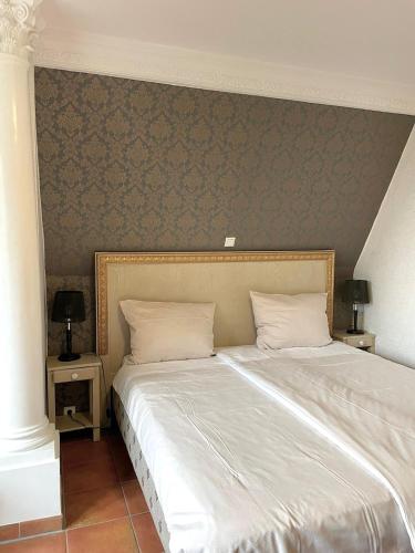 Postel nebo postele na pokoji v ubytování Hotel Borchers