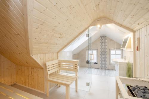 a room with a bench in the middle of a building at Ferienwohnung Bootsmann in Langeoog