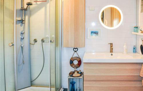 a bathroom with a shower and a sink at 5 Bedroom Beautiful Home In Karlstad in Karlstad