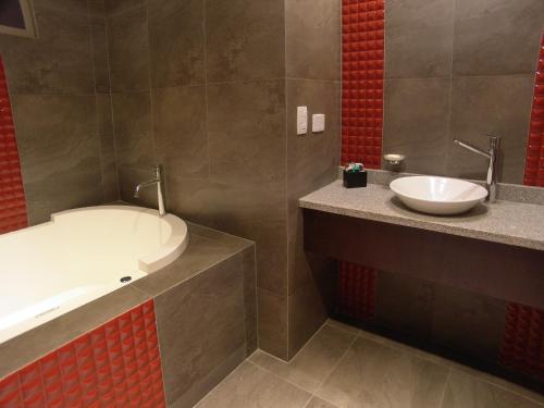 Un baño de Rioné Hotel Boutique