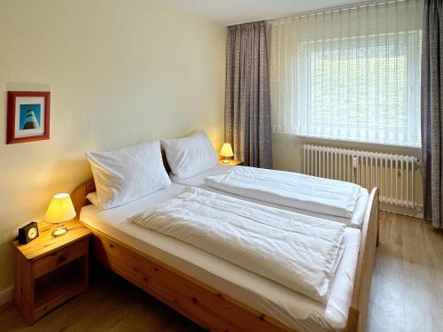 Postel nebo postele na pokoji v ubytování Kreft